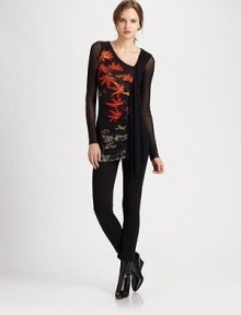 A lovely printed mesh top featuring an intriguing neckline, cascading ruffle front and sheer sleeves.Asymmetrical necklineSheer sleevesPrinted frontAbout 28 from shoulder to hemPolyamideDry cleanMade in Italy Model shown is 5'11 (180cm) wearing US size Small. A lovely printed mesh top featuring an intriguing neckline, cascading ruffle front and sheer sleeves.Asymmetrical necklineSheer sleevesPrinted frontAbout 28 from shoulder to hemPolyamideDry cleanMade in Italy Model shown is 5'11 (180cm) wearing US size Small.
