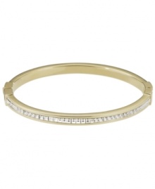 Style meant for stacking. This must-have design by Michael Kors combines a thin, stackable bangle with pave-set glass accents. Set in gold tone mixed metal. Approximate diameter: 2-1/2 inches. Style meant for stacking. This must-have design by Michael Kors combines a thin, stackable bangle with pave-set glass accents. Set in gold tone mixed metal. Approximate diameter: 2-1/2 inches.