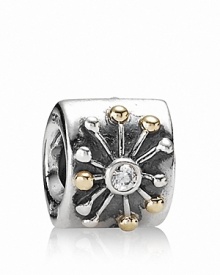 An oxidized silver PANDORA charm featuring a star design with 14K gold accents and a sparkling zirconia center.