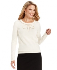 A beaded bow at the neckline of Charter Club's sweater is a charming finish to this flattering look.