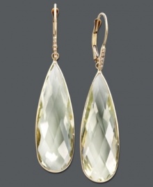 Pale green hues make the perfect splash. Earrings feature teardrop-shaped green amethyst (25 ct. t.w.) accented by a sparkling diamond. Crafted in 14k gold. Approximate drop: 2 inches. Pale green hues make the perfect splash. Earrings feature teardrop-shaped green amethyst (25 ct. t.w.) accented by a sparkling diamond. Crafted in 14k gold. Approximate drop: 2 inches.