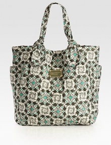 A whimsical print covers this carryall of sturdy nylon, with signature letter stitching and dual side pockets. Double top handles, 7 dropMagnetic snap closureTwo outside open pocketsOne inside zip pocketTwo inside open pocketsLogo-printed lining13W X 13½H X 4½DImported A whimsical print covers this carryall of sturdy nylon, with signature letter stitching and dual side pockets. Double top handles, 7 dropMagnetic snap closureTwo outside open pocketsOne inside zip pocketTwo inside open pocketsLogo-printed lining13W X 13½H X 4½DImported