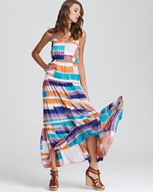 Streaks of bright color mingle with strips of white lace for a gorgeous spring from this designer favorite. Flaunting a lively bohemian spirit, the flowing silhouette stands out as the haute hit of the season. Streaks of bright color mingle with strips of white lace for a gorgeous spring from this designer favorite. Flaunting a lively bohemian spirit, the flowing silhouette stands out as the haute hit of the season.