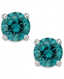 Add an ocean of color, in one small drop. These sparkling stud earrings feature round-cut blue diamonds (1 ct. t.w.) in a four-prong setting of 14k white gold. Approximate diameter: 1/4 inch. Add an ocean of color, in one small drop. These sparkling stud earrings feature round-cut blue diamonds (1 ct. t.w.) in a four-prong setting of 14k white gold. Approximate diameter: 1/4 inch.