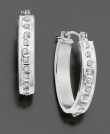These 14k white gold earrings inlaid with sparkling diamond accents are a sophisticated alternative to the classic hoop earrings. These 14k white gold earrings inlaid with sparkling diamond accents are a sophisticated alternative to the classic hoop earrings.