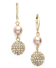 A touch of elegance. Accent your evening gown or a polished business suit with a hint of pink shimmer. Charter Club earrings feature simulated pink pearls and a glass fireball accent. Set in gold tone mixed metal. Approximate drop: 2-1/2 inches. A touch of elegance. Accent your evening gown or a polished business suit with a hint of pink shimmer. Charter Club earrings feature simulated pink pearls and a glass fireball accent. Set in gold tone mixed metal. Approximate drop: 2-1/2 inches.