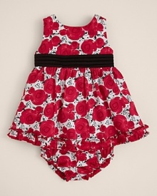 A touch of elegance for your little gal, this empire waist dress blooms with color and classic style. A touch of elegance for your little gal, this empire waist dress blooms with color and classic style.