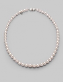 A classic strand of graduated white Akoya pearls with a pretty filigree clasp. 7mm- 9mm white round cultured pearls Quality: A1 18k white gold Length, about 18 Mikimoto signature clasp Imported A classic strand of graduated white Akoya pearls with a pretty filigree clasp. 7mm- 9mm white round cultured pearls Quality: A1 18k white gold Length, about 18 Mikimoto signature clasp Imported