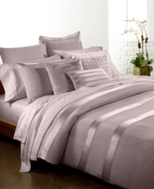 The Essentials Dusk quilted sham from Donna Karan adds elegance and comfort to your bed with perfectly tailored puckered stitch details.