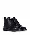 Add a kick of Downtown cool to your edgy daytime look with Marc by Marc Jacobs black leather lace-ups, a chic fusion of biker boots and sneakers - Rounded toe, stitched welt, flat laces, rubber lug sole - Wear with printed pants and moto jackets, or with opaque tights, chunky knits and micro-minis