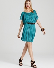 Cut in a billowy silhouette, this richly hued Akiko dress is toughened up with a standout belt.