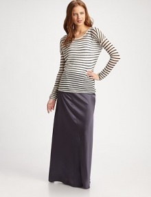 Lengthy, lustrous style can be paired with an airy blouse or timeless tank. Back zipperAsymmetrical stitchingTriacetateDry cleanImported Lengthy, lustrous style can be paired with an airy blouse or timeless tank. Back zipperAsymmetrical stitchingTriacetateDry cleanImported