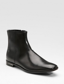 An elegant dress boot is designed in calfskin leather with side zips for easy on and off. Leather lining Padded insole Leather sole Made in Italy An elegant dress boot is designed in calfskin leather with side zips for easy on and off. Leather lining Padded insole Leather sole Made in Italy