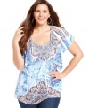 Get a statement-making look with Style&co.'s short sleeve plus size top, finished by a striking sublimated-print.