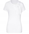 Stylish top in fine, white modal - A chic, ultra-feminine twist on the classic t-shirt - Short sleeves and crew neck - Oversize bow embellishment at left shoulder - Long, lean silhouette tapers gently at waist - Hip yet sweet, ideal for both work and play - Layer beneath a blazer or pair with jeans, a pencil skirt or dressy shorts