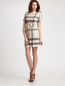 The iconic end-on-end windowpane check print meets a belted, stretch cotton silhouette with classic Princess seams and military-inspired epaulettes. Round neckEpaulettesSnap detail at short sleevesBack zipperCotton liningAbout 22 from natural waist97% cotton/2% nylon/1% elastaneDry cleanImported Model shown is 5'11½ (181cm) wearing US size 4. 