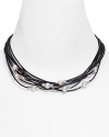 Multiple leather strands are punctuated with softly glowing pearls in this necklace from Majorica.