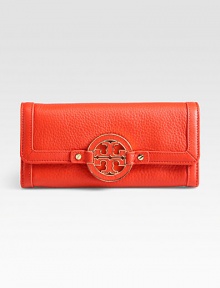 Beautifully pebbled leather with a prominent, self covered logo emblem.Snap button flap closureOne inside zip pocketTen credit card slotsTwo bill compartmentsFully lined7½W X 3½H X 1DImported Beautifully pebbled leather with a prominent, self covered logo emblem.Snap button flap closureOne inside zip pocketTen credit card slotsTwo bill compartmentsFully lined7½W X 3½H X 1DImported
