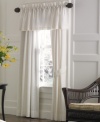 Dream of serene pastures with the Flowering Meadow window valance from Lenox. Characterized by embroidered yellow scallop trim along the hem, this valance in crisp white enlivens your bedroom with invigorating light.