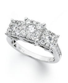 With its polished setting, and stunning three-stone design, this engagement ring is sure to get her attention. Band crafted in 14k white gold with dozens of round-cut diamonds (1-1/2 ct. t.w.) in the center and at the shoulders. With its polished setting, and stunning three-stone design, this engagement ring is sure to get her attention. Band crafted in 14k white gold with dozens of round-cut diamonds (1-1/2 ct. t.w.) in the center and at the shoulders.