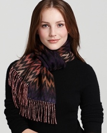 A colorful ombré scarf in a zig zag print gives an edgy style to your favorite dress, top or coat.