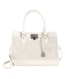 Cole Haan updates their iconic vintage-inspired tote with a pretty perforated floral pattern. Smooth leather and gunmetal hardware add just enough edge this prim and proper bag. Cole Haan updates their iconic vintage-inspired tote with a pretty perforated floral pattern. Smooth leather and gunmetal hardware add just enough edge this prim and proper bag.