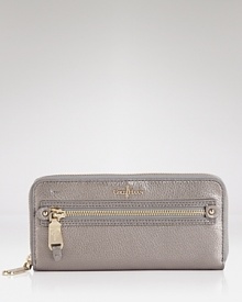 Don't forget the essentials. Getting away or simply darting around town, this leather wallet from Cole Haan flaunts an always-on-top of it design, plenty of pockets, and a slim profile. Don't forget the essentials. Getting away or simply darting around town, this leather wallet from Cole Haan flaunts an always-on-top of it design, plenty of pockets, and a slim profile.