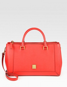 A saffiano leather design that possesses the character of German functionality and craftsmanship.Double top handles, 5¼ dropDetachable adjustable shoulder strap, 17-21 dropThree inner compartments; two zip and one magnetic flap closureProtective metal feetOne inside zip pocketFully lined14W X 8½H X 6½DMade in Italy A saffiano leather design that possesses the character of German functionality and craftsmanship.Double top handles, 5¼ dropDetachable adjustable shoulder strap, 17-21 dropThree inner compartments; two zip and one magnetic flap closureProtective metal feetOne inside zip pocketFully lined14W X 8½H X 6½DMade in Italy