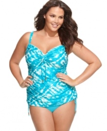 Coco Reef's plus size tankini top works in trendy tie dye with a bright, bold beach look. Coco Reef's plus size tankini top works in trendy tie dye with a bright, bold beach look.