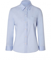 The classic dress shirt gets a modern update with this boxy blouse from Jil Sander Navy - Small spread collar, three-quarter sleeves, front button placket, single chest pocket, oversized silhouette - Pair with cropped trousers, a leather jacket, and ballet flats