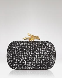 This smart, DIANE von FURSTENBERG tweed clutch is a study in understated after-hours accessorizing. This smart, DIANE von FURSTENBERG tweed clutch is a study in understated after-hours accessorizing.