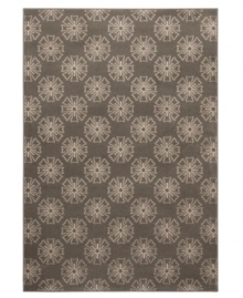 Intriguing star medallions cascade in rich neutrals across this Tribecca area rug, creating a sophisticated, yet casual ground for any contemporary decor. Woven of soft polypropylene for superior stain resistance and durability. (Clearance)