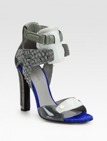 Multi-tone leather, patent leather and uniquely textured suede design with a duo of wrap-around ankle straps. Self-covered heel, 4 (100mm)Patent leather, suede and leather upperLeather lining and solePadded insoleImported Multi-tone leather, patent leather and uniquely textured suede design with a duo of wrap-around ankle straps. Self-covered heel, 4 (100mm)Patent leather, suede and leather upperLeather lining and solePadded insoleImported