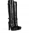 Rocker-chic looks get an ultra luxurious finish with Belstaffs jet black knee-high platform boots, complete with buckled straps for that edgy moto feel - Rounded toe, chunky heel, rubber lug sole, pull-on style - Team with modern knits and trend favorite leather leggings