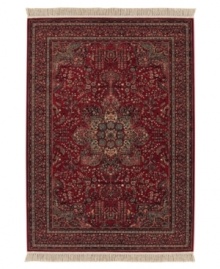 With regal designs that pay homage to the ancient art of rug-making, this piece imparts a classic, yet modern feel with rich colors that reflect the most popular looks of today. Featuring a dramatic center medallion, sweeping out in a burst of branches and blossoms, and accented in deep tones of antique red. Meticulous power-loom construction with Couristan's patented locked-in-weave and crystal-point finish. 25-year limited warranty. With regal designs that pay homage to the ancient art of rug-making, this piece imparts a classic, yet modern feel with rich colors that reflect the most popular looks of today. Featuring a dramatic center medallion, sweeping out in a burst of branches and blossoms, and accented in deep tones of antique red. Meticulous power-loom construction with Couristan's patented locked-in-weave and crystal-point finish. 25-year limited warranty.