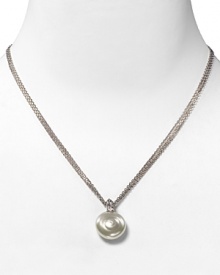 Centered on a beautiful coin pearl, this pendant necklace features a triple stainless steel chain. Designed by Majorica. Centered on a beautiful coin pearl, this pendant necklace features a triple stainless steel chain. Designed by Majorica.