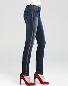 Supple lamb-leather side seams bring a hint of luxury to these otherwise laid-back J Brand skinny jeans. Supple lamb-leather side seams bring a hint of luxury to these otherwise laid-back J Brand skinny jeans.