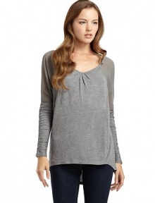 THE LOOKSlight v-neck with pleat detailsDolman sleeves with ruched accentsSheer chiffon shouldersHi-lo hemTHE FITAbout 26 from shoulder to hemTHE MATERIALViscoseCARE & ORIGINDry cleanImportedModel shown is 5'9½ (176cm) wearing US size Small. THE LOOKSlight v-neck with pleat detailsDolman sleeves with ruched accentsSheer chiffon shouldersHi-lo hemTHE FITAbout 26 from shoulder to hemTHE MATERIALViscoseCARE & ORIGINDry cleanImportedModel shown is 5'9½ (176cm) wearing US size Small.