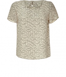 Inject quirky-cool style into your day look with this chic top from Marc by Marc Jacobs - Round neck, short sleeves, back bow detail, loose fit, all-over print - Style with cropped trousers, a blazer, and platforms Inject quirky-cool style into your day look with this chic top from Marc by Marc Jacobs - Round neck, short sleeves, back bow detail, loose fit, all-over print - Style with cropped trousers, a blazer, and platforms