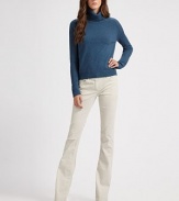 Semi-sheer wool turtleneck with a perforated back and sleeves. Ribbed turtleneckLong, perforated sleevesRibbed cuffs and hemPerforated backWoolDry cleanImportedModel shown is 5'10 (177cm) wearing US size 4.