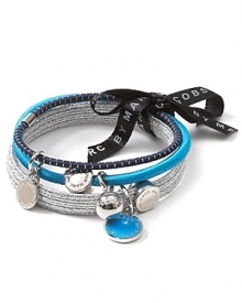 A set of three stylish hair elastics with signature MARC BY MARC JACOBS charms. A set of three stylish hair elastics with signature MARC BY MARC JACOBS charms.