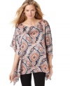 Stylishly slouchy, this paisley-printed MICHAEL Michael Kors tunic looks effortlessly chic with skinny jeans or leggings!