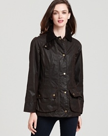 Barbour's medium-weight waxed cotton jacket with cozy tartan liner keeps you warm, dry and impeccably stylish. Barbour's medium-weight waxed cotton jacket with cozy tartan liner keeps you warm, dry and impeccably stylish.