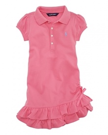 A signature polo design rendered in traditional cotton mesh is transformed into a casual girlie dress with the addition of a ruffle hem. A signature polo design rendered in traditional cotton mesh is transformed into a casual girlie dress with the addition of a ruffle hem.