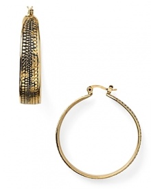 Be a global goddess with these golden hoop earrings from RJ Graziano. The shape is perfectly simple, while a touch of tribal-inspired texture gives this pair added glamor. Be a global goddess with these golden hoop earrings from RJ Graziano. The shape is perfectly simple, while a touch of tribal-inspired texture gives this pair added glamor.