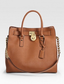 A structured design in luxurious leather with chic, signature hardware accents.Double top handles, 4¾ dropChain and leather shoulder strap, 12½ dropMagnetic snap closureProtective metal feetOne inside zip pocketFour inside open pocketsOne key hookCotton lining14¼W X 13H X 5½DImported A structured design in luxurious leather with chic, signature hardware accents.Double top handles, 4¾ dropChain and leather shoulder strap, 12½ dropMagnetic snap closureProtective metal feetOne inside zip pocketFour inside open pocketsOne key hookCotton lining14¼W X 13H X 5½DImported