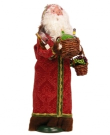 Spread and say cheers with this festive Santa Claus figurine, handcrafted by Byers' Choice. With a look of sheer joy, two bottles of wine and a basket of grapes, jolly St. Nick is ready to celebrate.