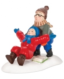 Ralphie catches kid brother Randy when he can't put his arms down in this hilarious figurine from A Christmas Story Village by Department 56.