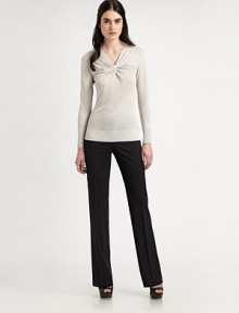A classic design with a romantic twist: a twisted front detail that won't go unnoticed. V-neckLong sleevesAbout 25 from shoulder to hem60% linen/35% viscose/5% nylonHand washImported of Italian fabric Model shown is 5'11 (180cm) wearing US size Small. A classic design with a romantic twist: a twisted front detail that won't go unnoticed. V-neckLong sleevesAbout 25 from shoulder to hem60% linen/35% viscose/5% nylonHand washImported of Italian fabric Model shown is 5'11 (180cm) wearing US size Small.
