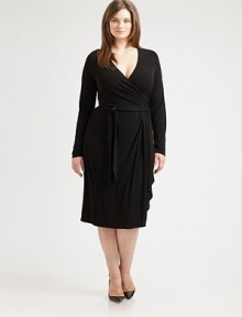 Featuring a universally flattering, faux-wrap front, this soft crepe design was designed to comfortably complement your curves. V-neckLong sleevesSelf-tie beltAbout 28 from natural waist72% viscose/28% polyesterHand washImported Featuring a universally flattering, faux-wrap front, this soft crepe design was designed to comfortably complement your curves. V-neckLong sleevesSelf-tie beltAbout 28 from natural waist72% viscose/28% polyesterHand washImported